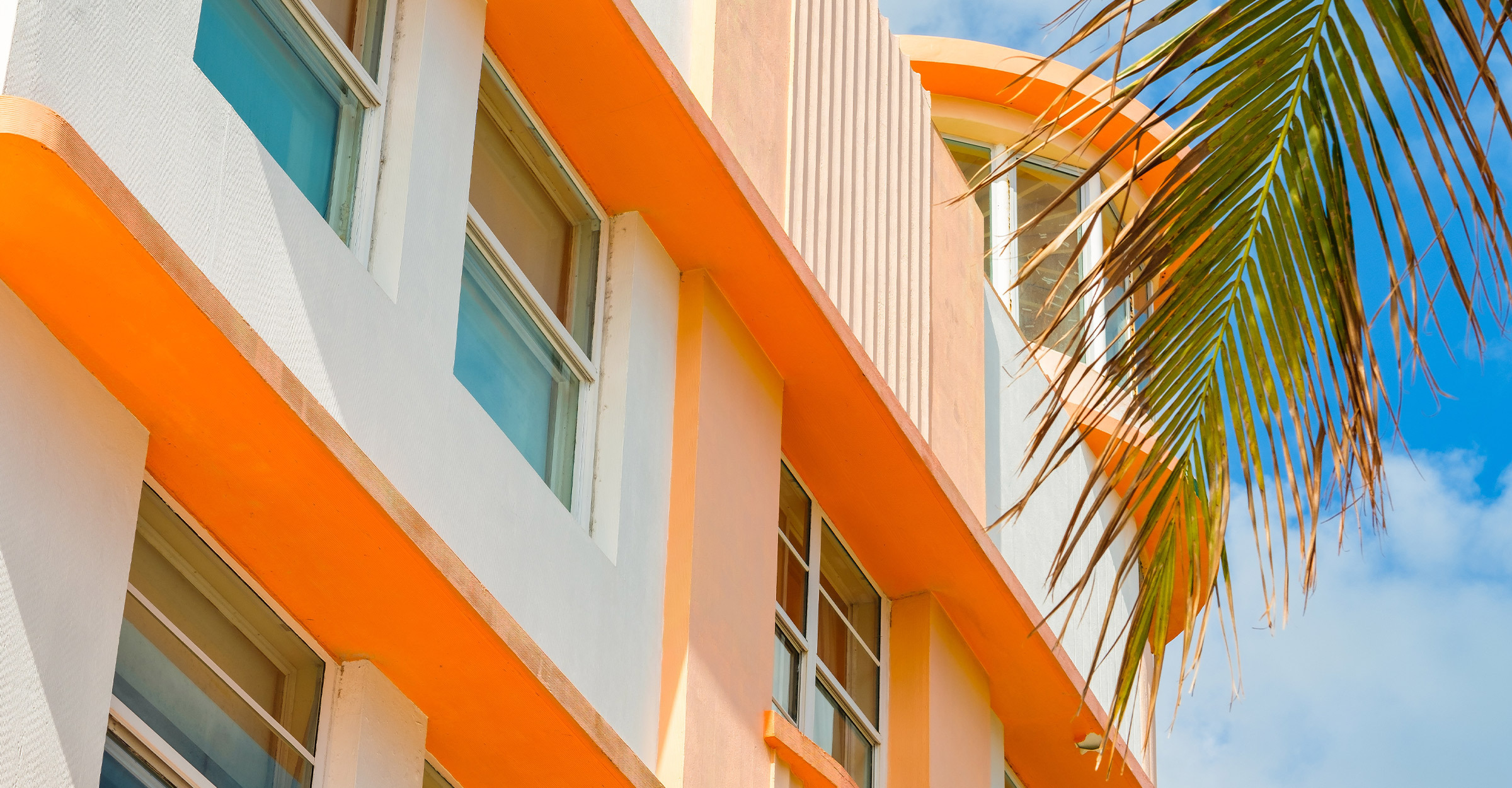 Orange Building with Palm Tree